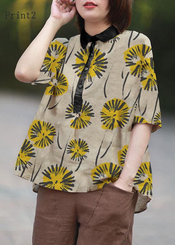 Blouse with peter pan collar print and half sleeves