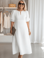 Maxi dress with puff sleeves and tailored fit