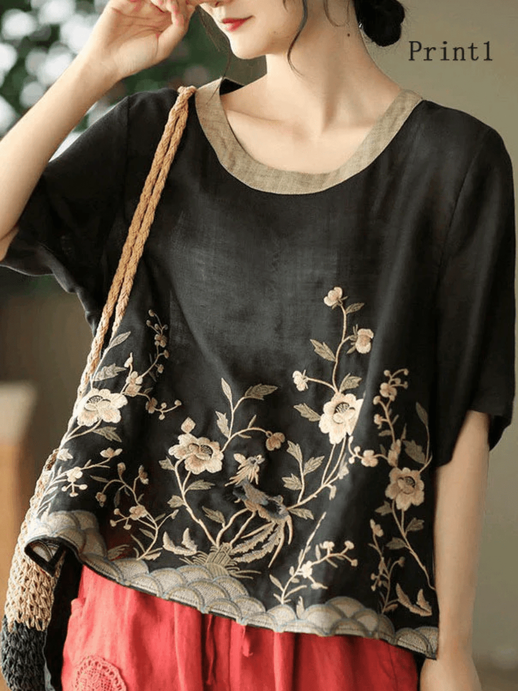 Linen top with embroidery low high hem and short sleeves