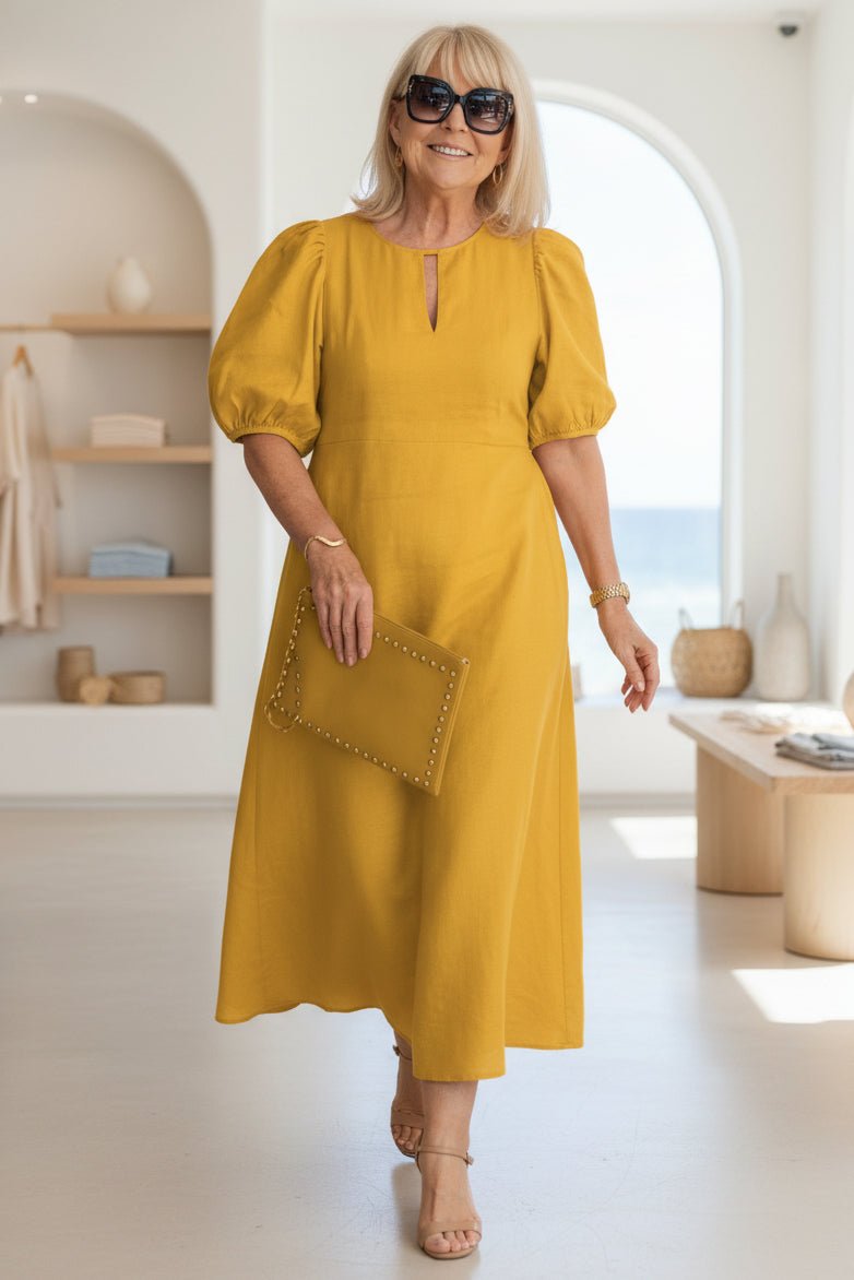 Maxi dress with puff sleeves and tailored fit