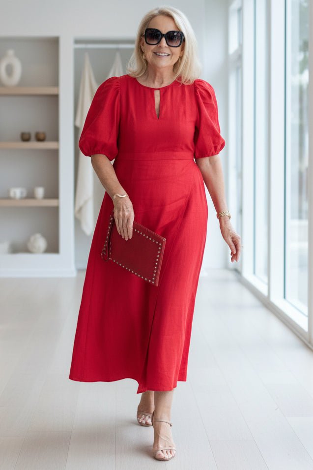 Maxi dress with puff sleeves and tailored fit