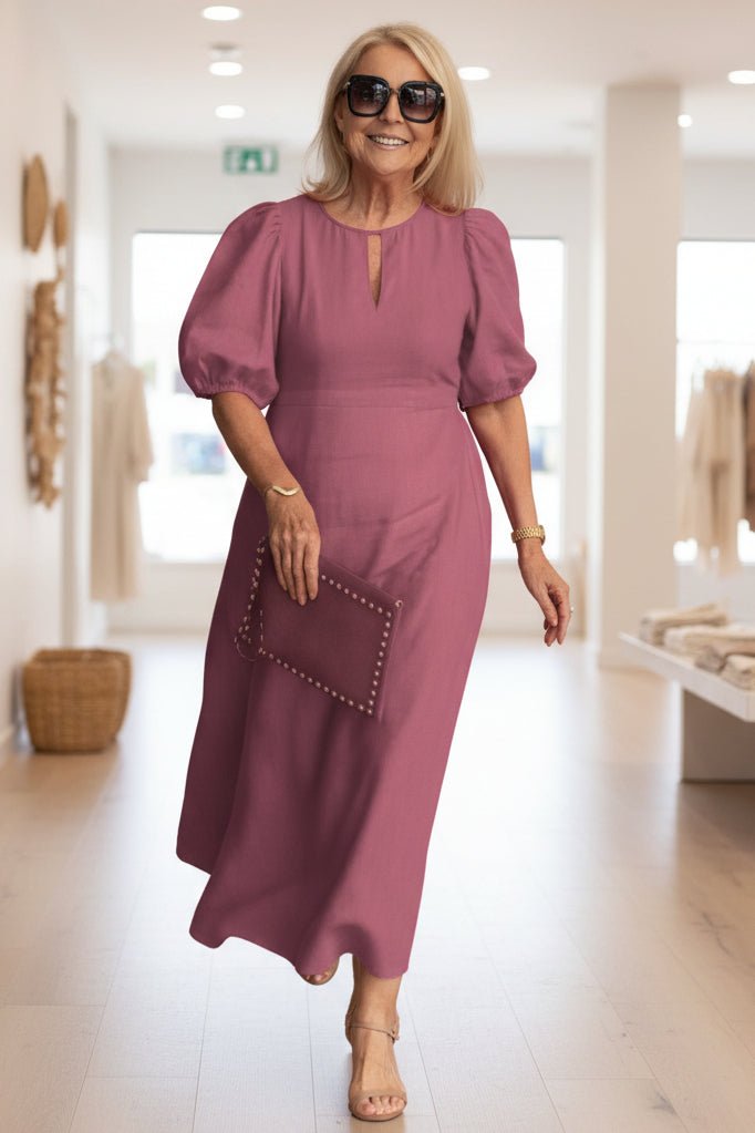 Maxi dress with puff sleeves and tailored fit