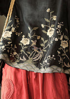 Linen top with embroidery low high hem and short sleeves