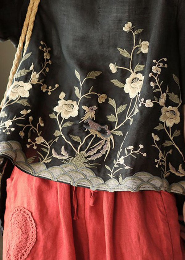 Linen top with embroidery low high hem and short sleeves